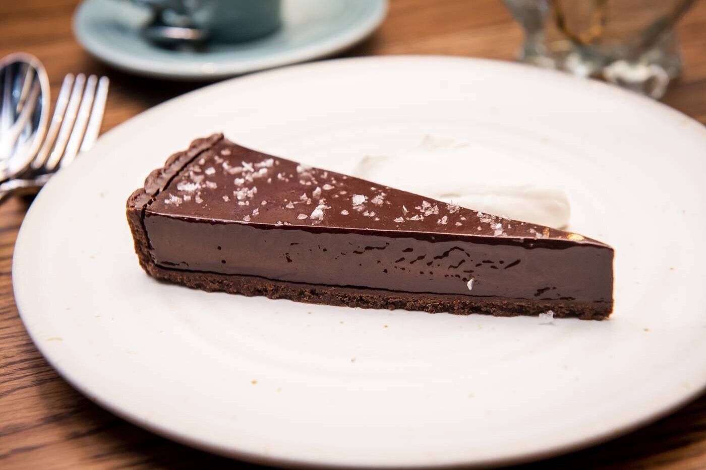 Dark chocolate ganache tart with Maldon salt and sesame cream