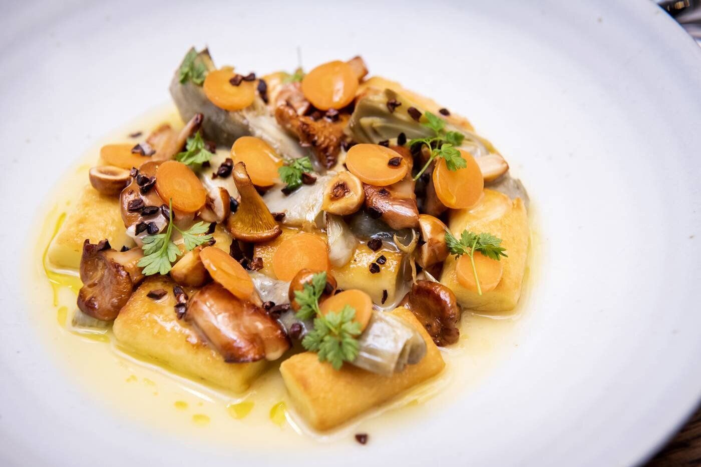 Parisian-style choux gnocchi with artichoke, chanterelles and vin jaune